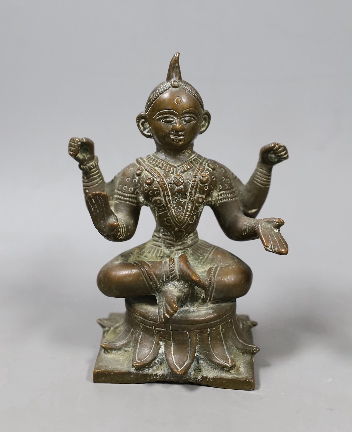 An Indian bronze tantric figure. 14cm high